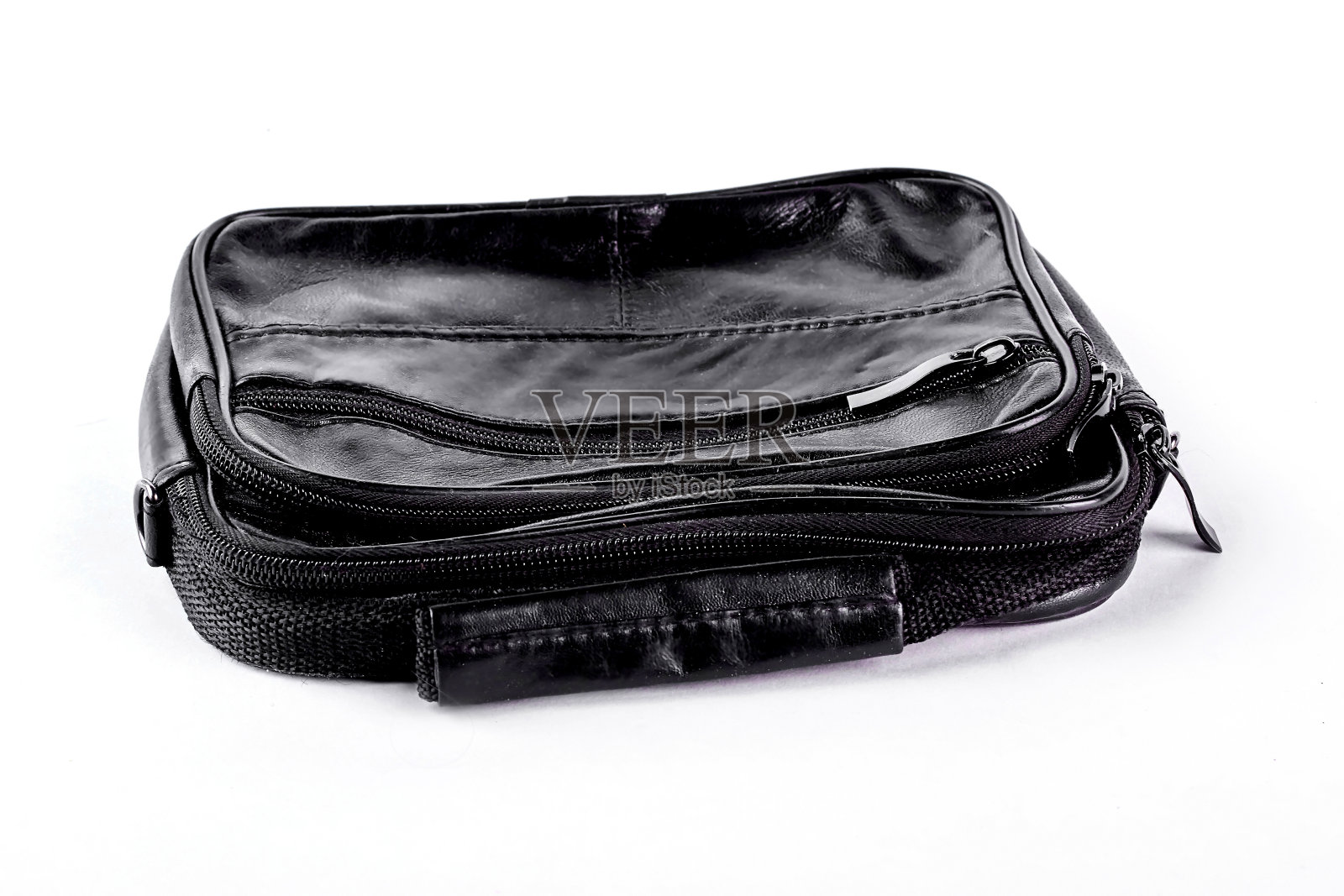 男性复古黑色皮包。照片摄影图片