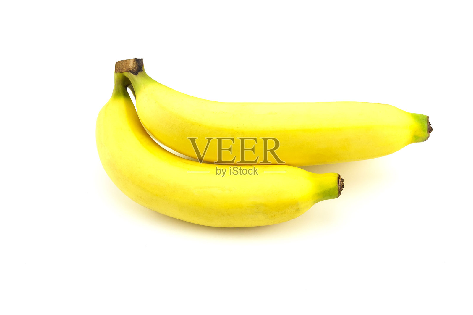 白色背景上孤立的一串成熟香蕉照片摄影图片