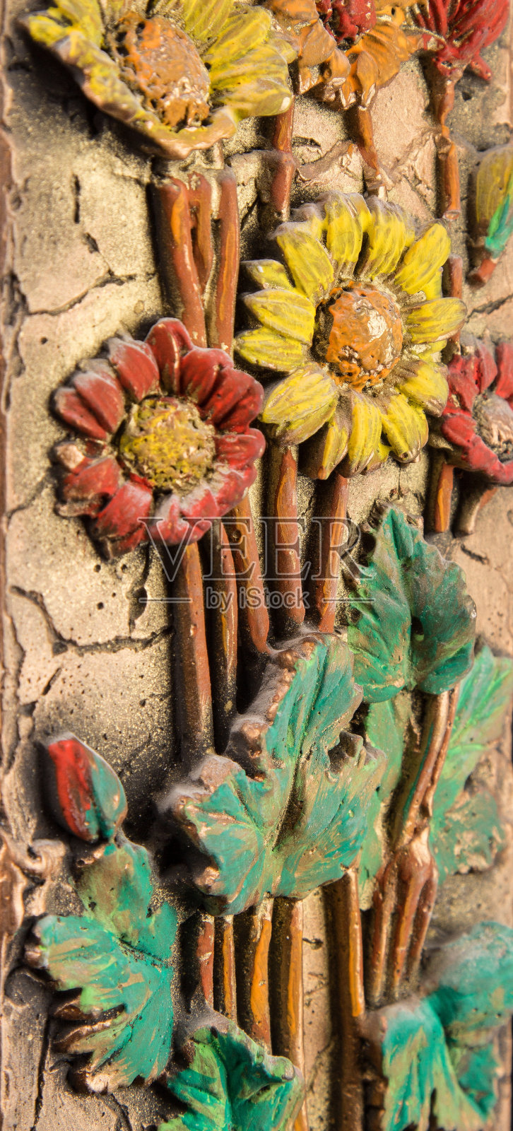 石膏画，彩色的花卉图案在一个孤立的背景照片摄影图片