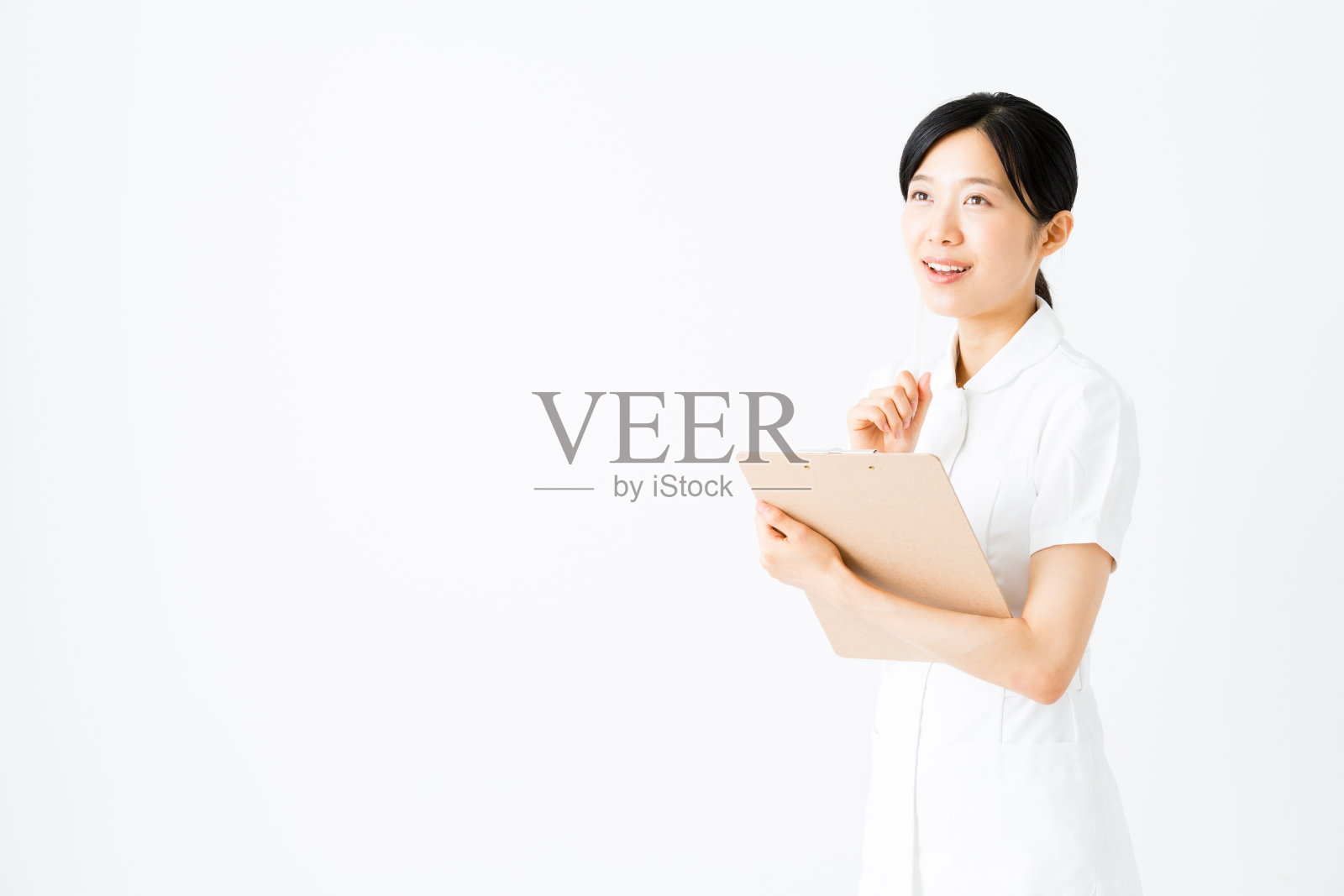 年轻亚洲护士的肖像孤立在白色背景照片摄影图片