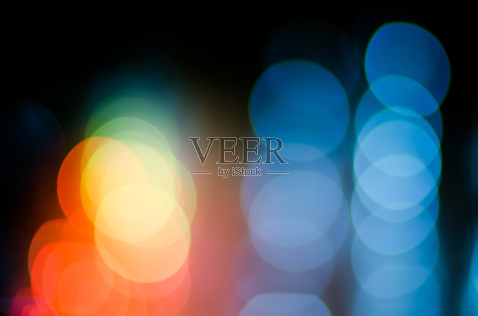 圣诞节的背景。节日抽象背景与散焦灯光照片摄影图片