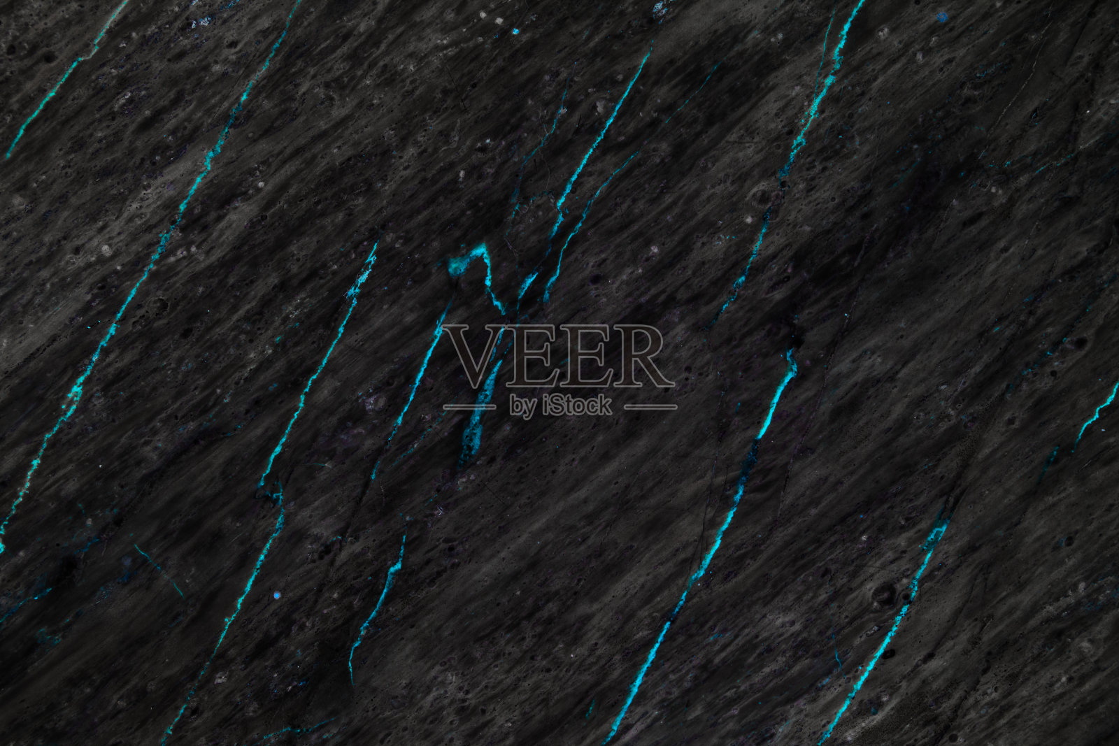 深色的黑色大理石纹理与自然图案为背景。照片摄影图片