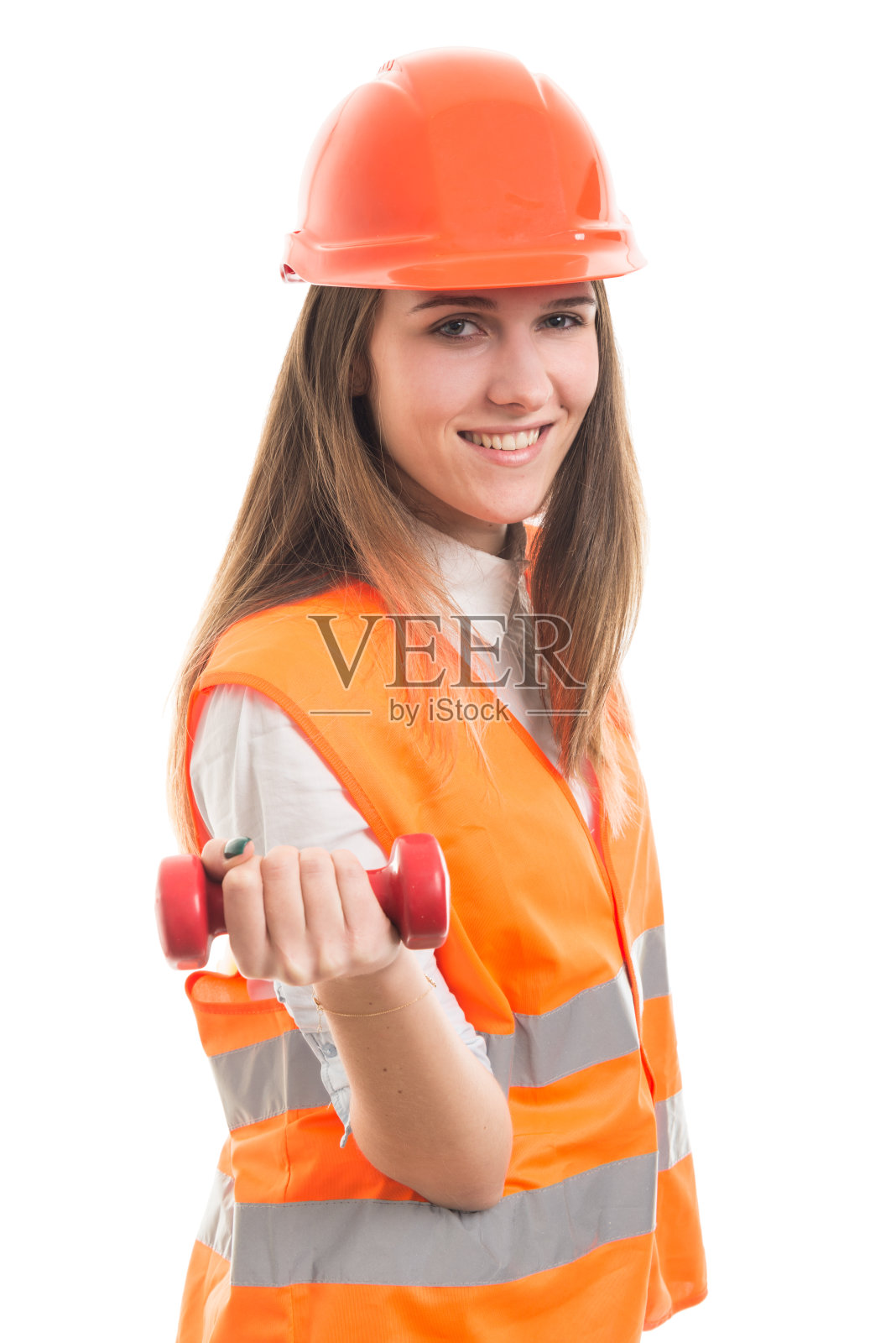 强壮的女建筑师举着哑铃照片摄影图片