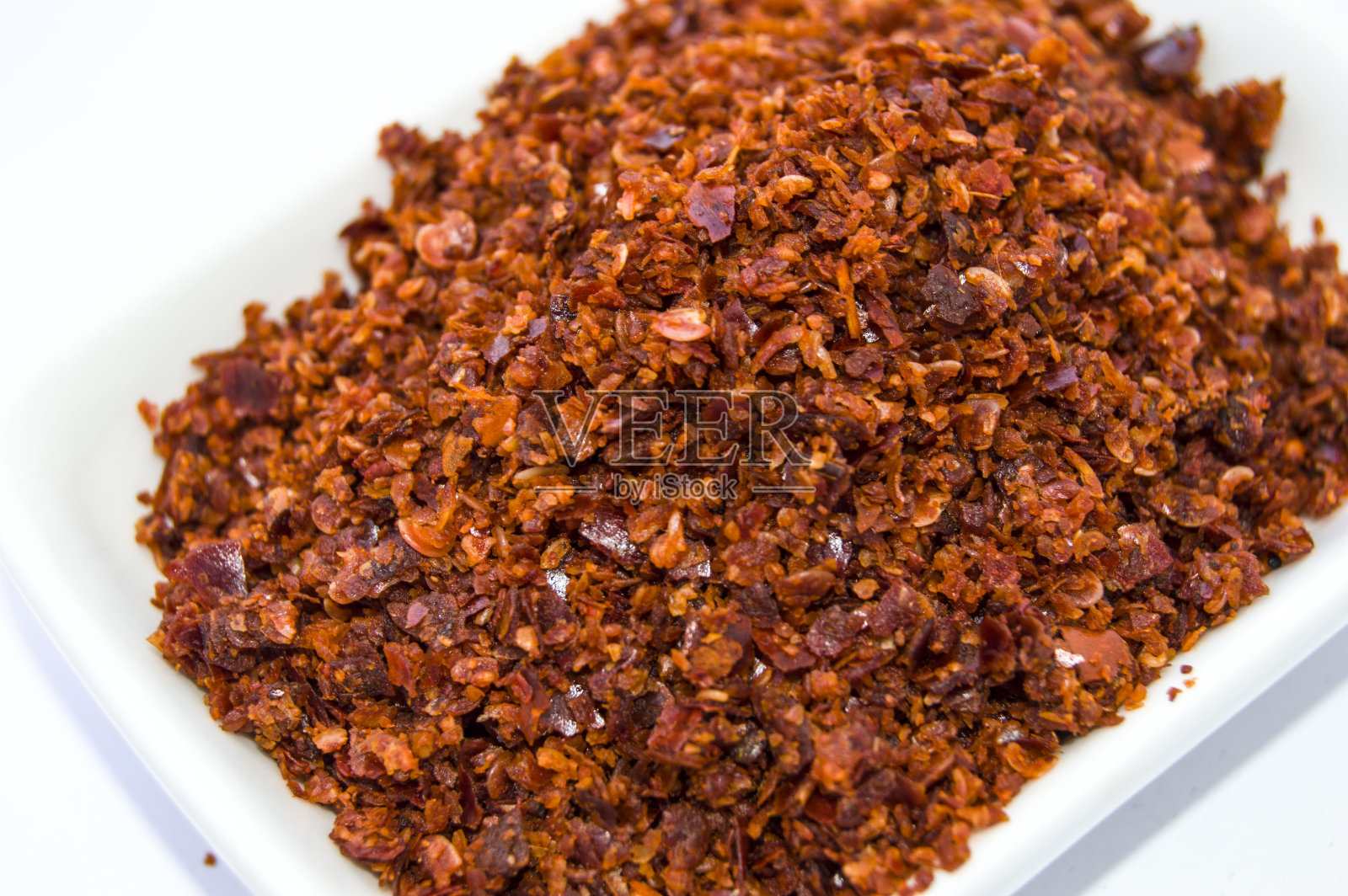 苦红干辣椒、袋装干辣椒粉、红辣椒粉照片摄影图片