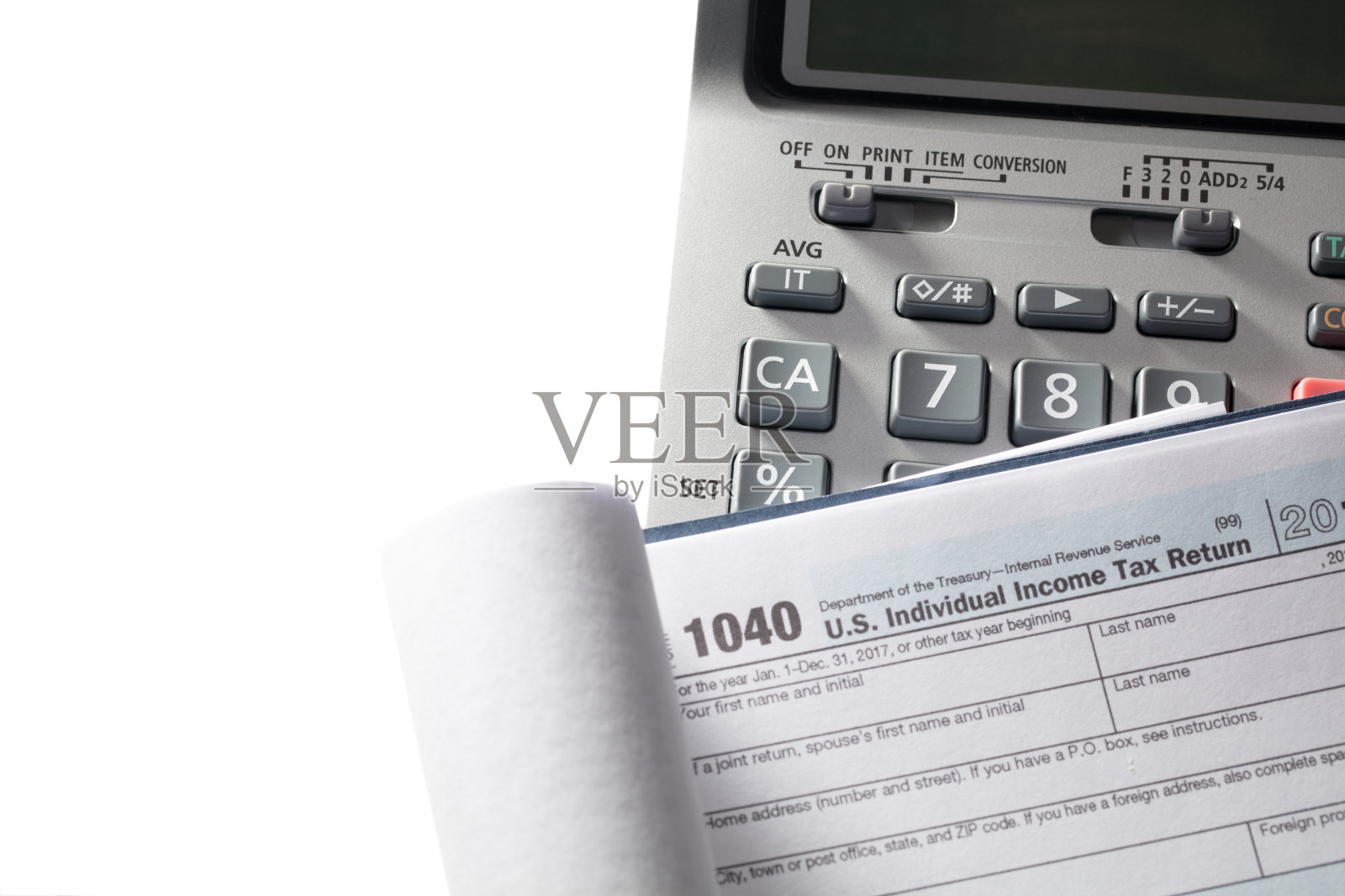 带有计算器的所得税文件照片摄影图片