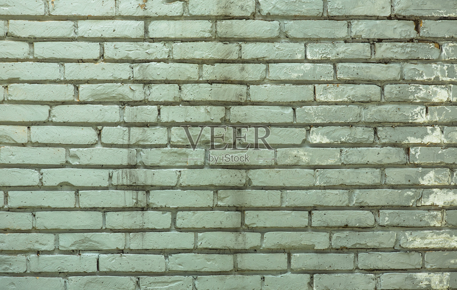 青砖墙久经风霜，伤痕累累照片摄影图片