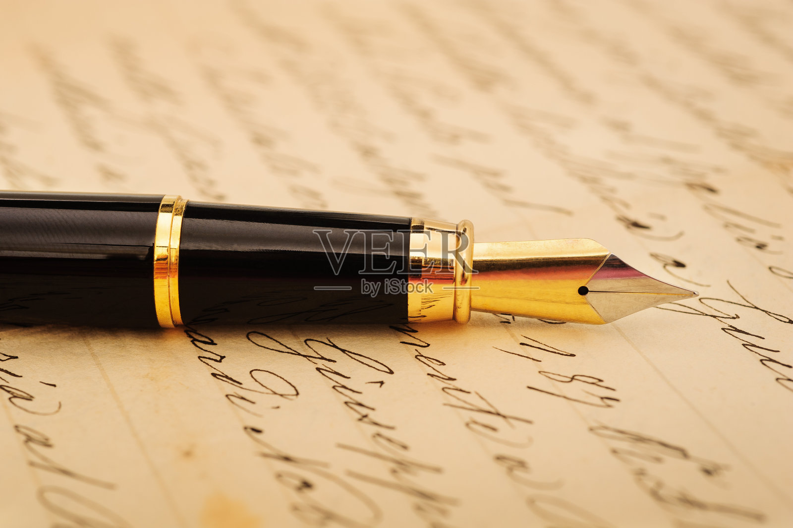 钢笔在信上照片摄影图片