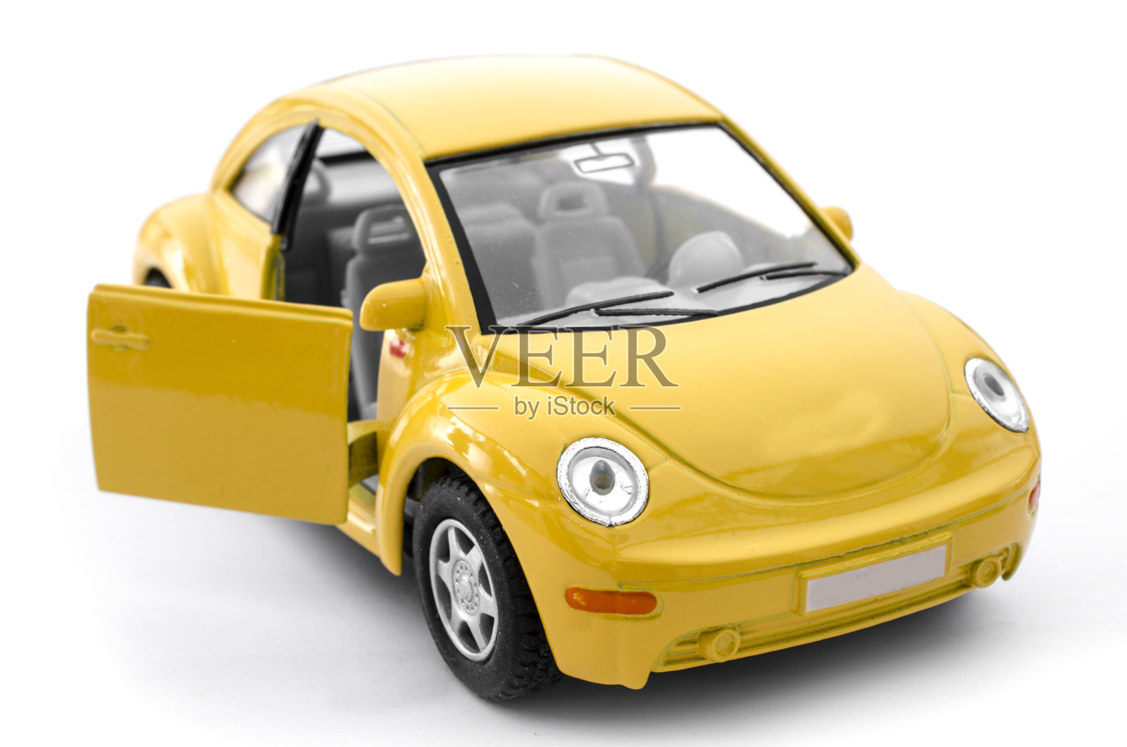 黄色的玩具车开着门照片摄影图片