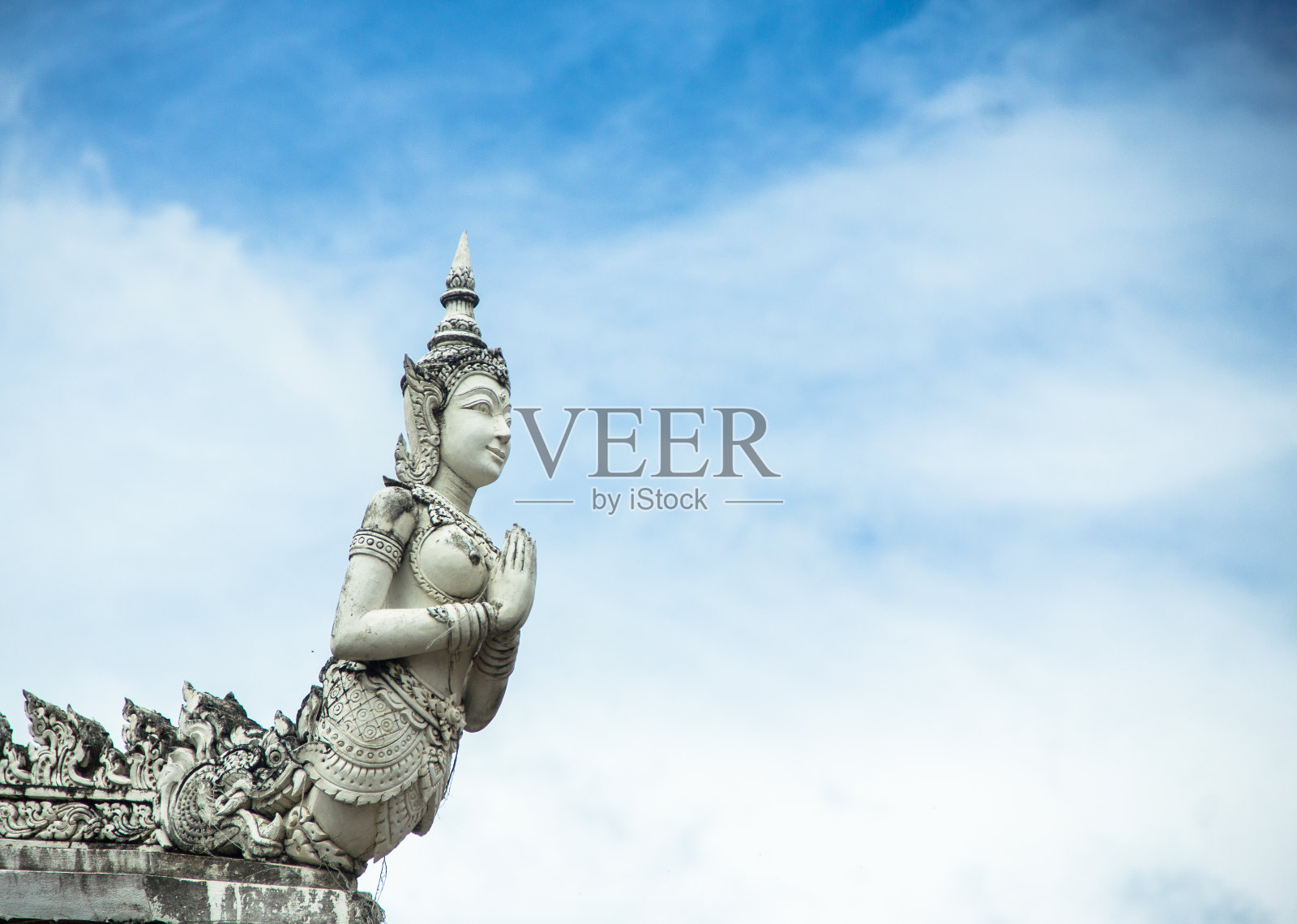 泰国的一个神的雕塑人物照片摄影图片