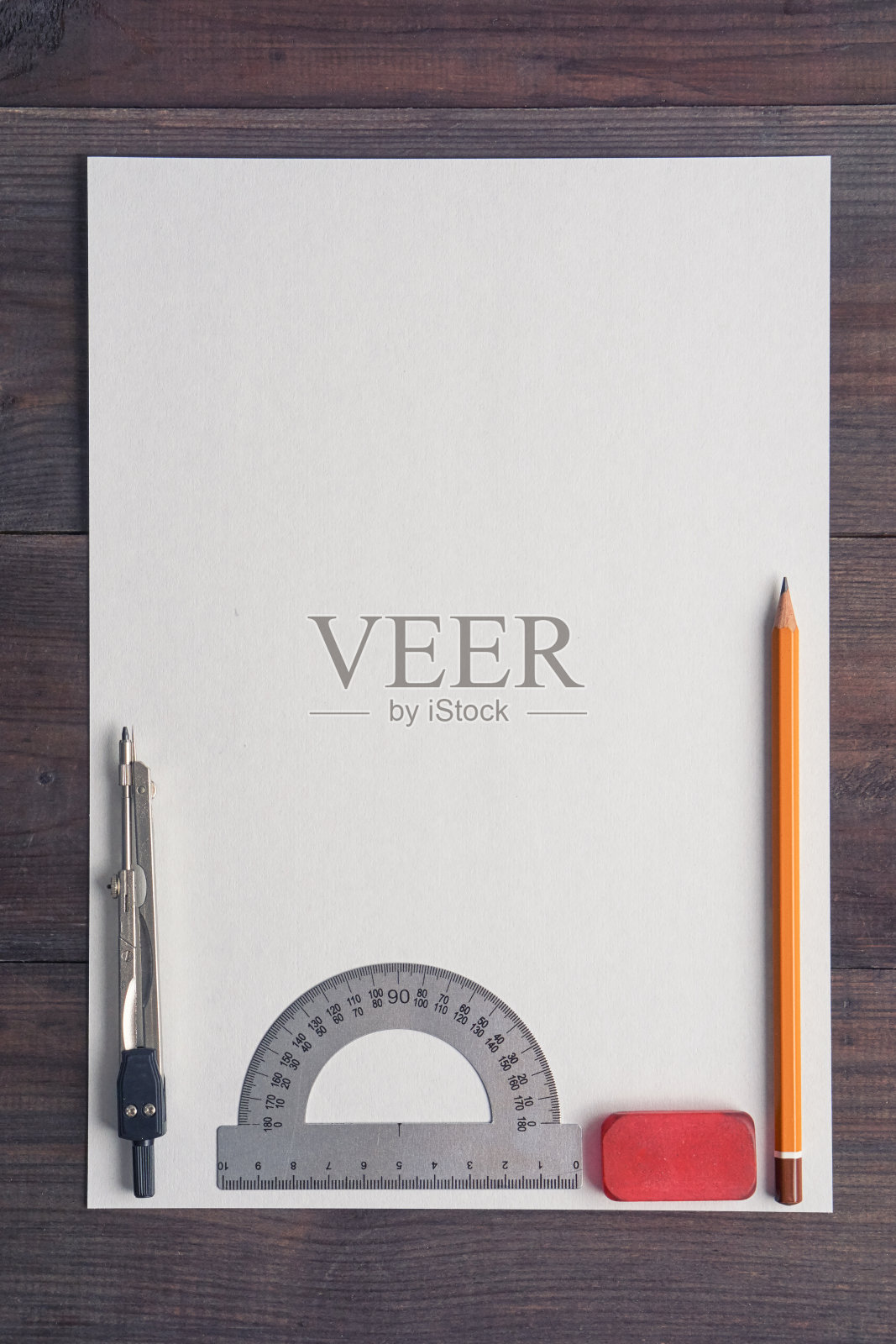 桌上有一张白纸和铅笔照片摄影图片