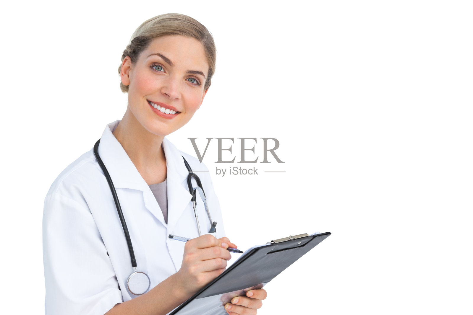 带着写字板微笑的护士照片摄影图片