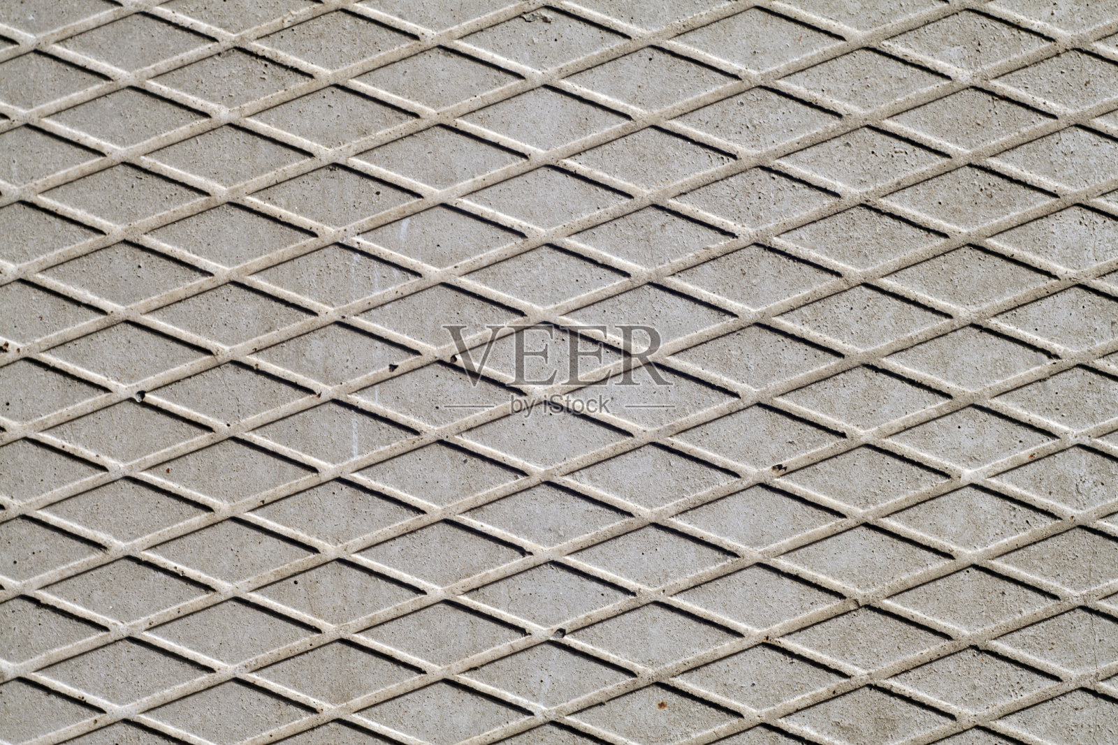 灰色菱形水泥地面。照片摄影图片