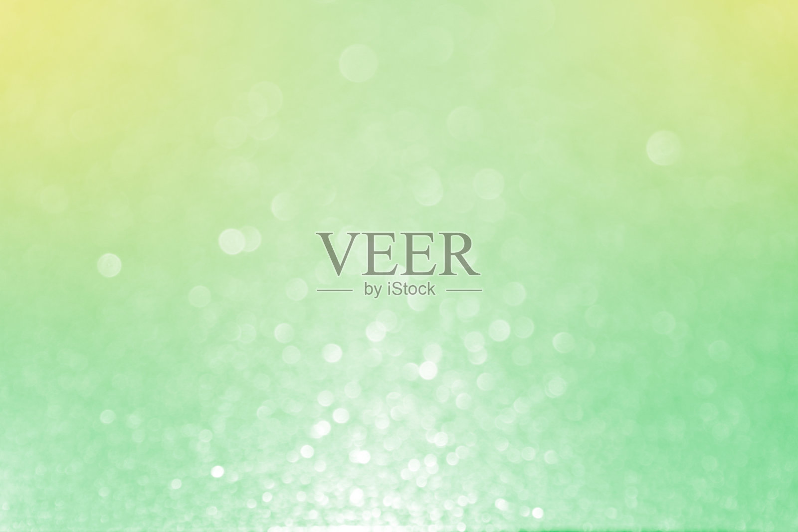 近距离柔和的绿色黄色闪光散景抽象背景照片摄影图片