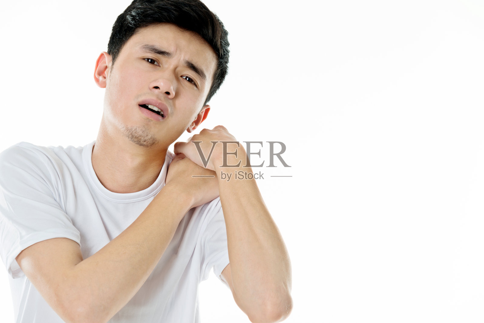 肩痛的年轻人照片摄影图片