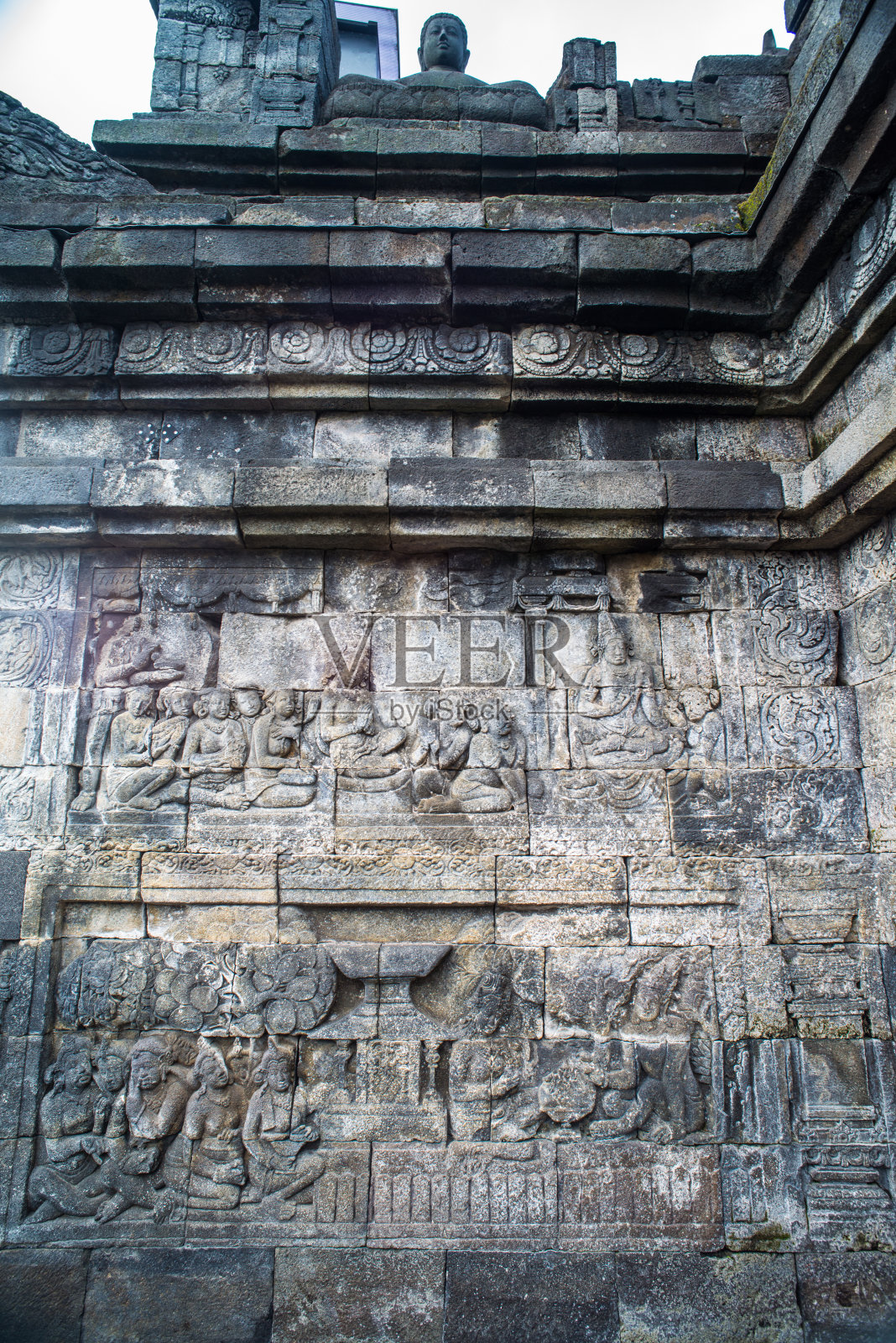 婆罗浮屠寺庙浮雕，位于印度尼西亚中爪哇马格朗婆罗浮屠寺庙照片摄影图片