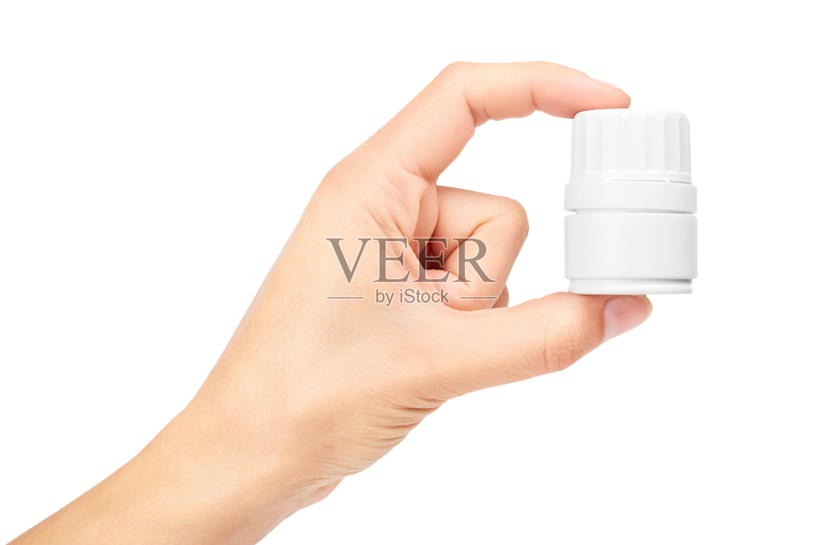 女性手里拿着装有药丸的瓶子。在白色背景上隔离照片摄影图片