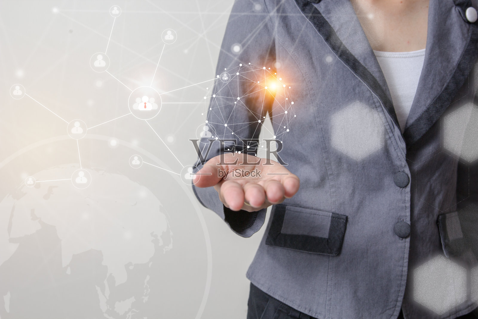 未来的技术网络概念，商人持有世界各地的网络符号和图形界面。照片摄影图片