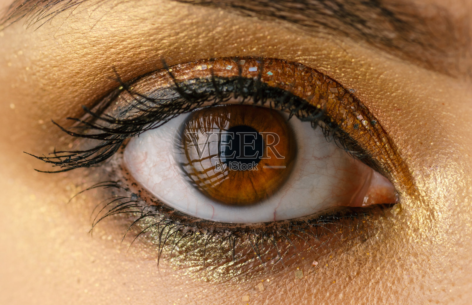 眼睛,金色化妆。照片摄影图片