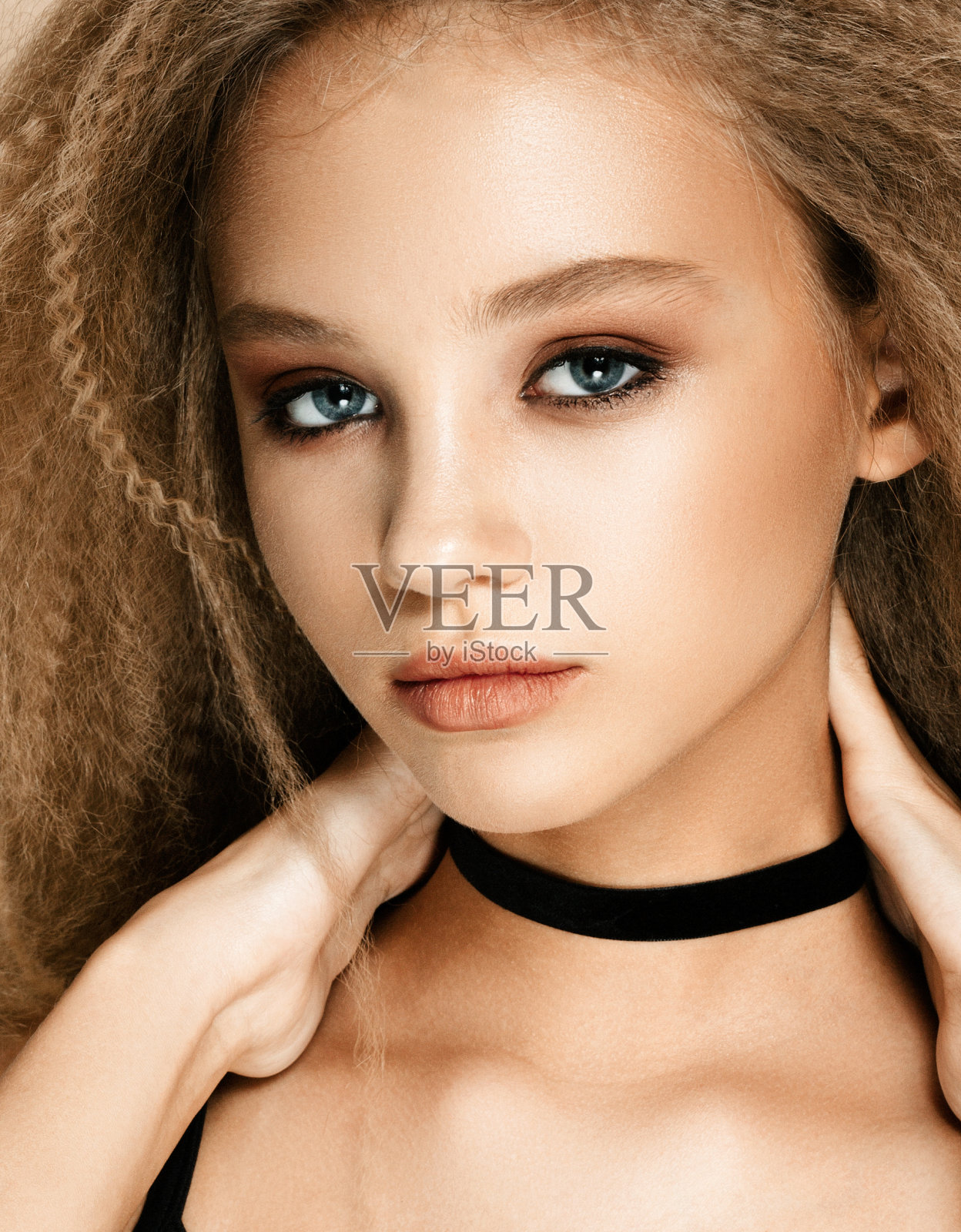 美丽的女人面对近工作室照片摄影图片