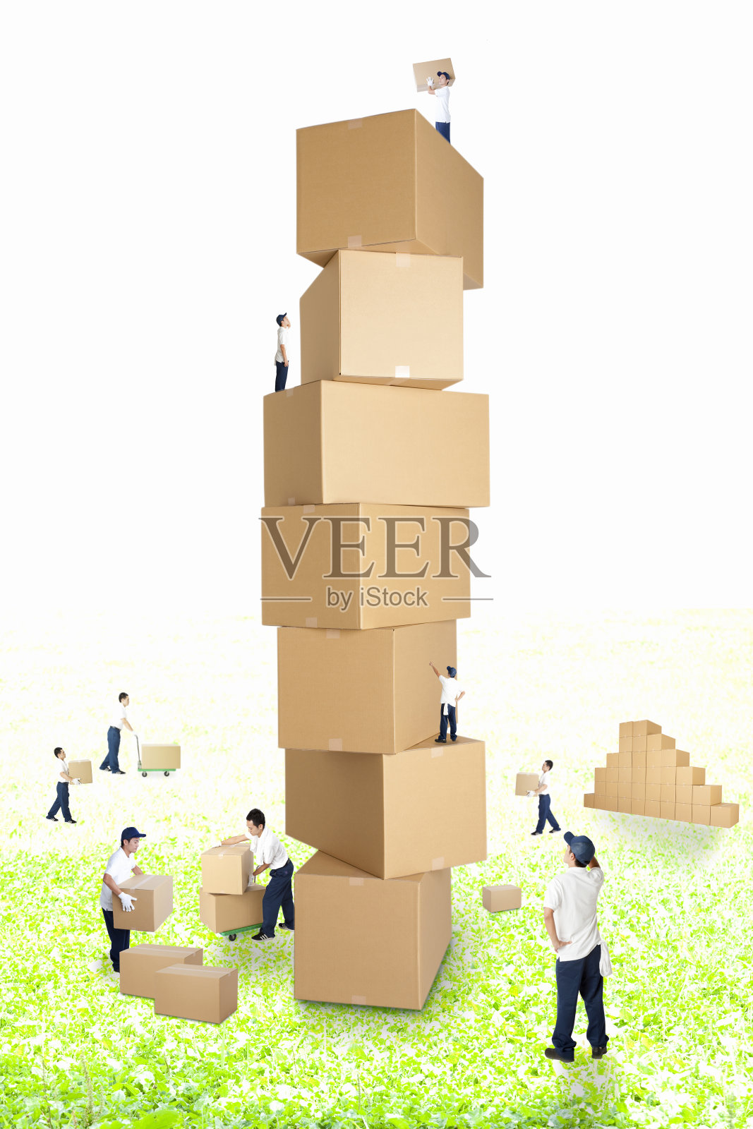 工人叠纸板照片摄影图片