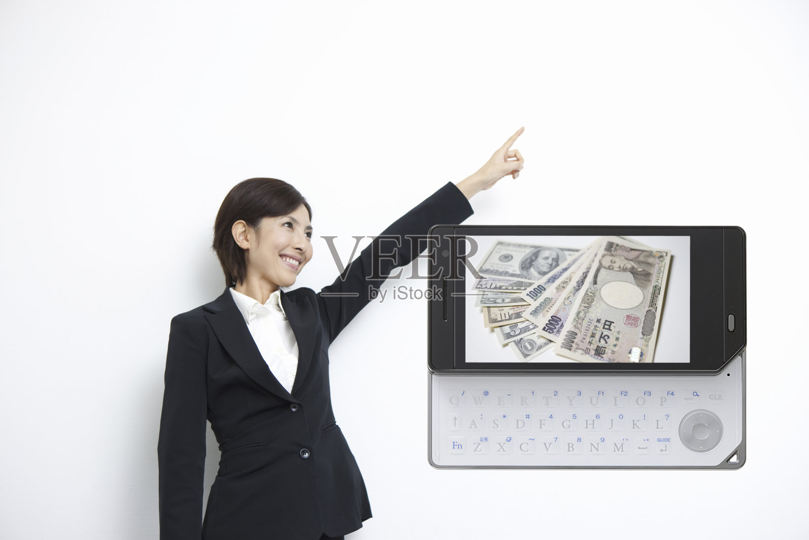 现金到OL和手机屏幕照片摄影图片