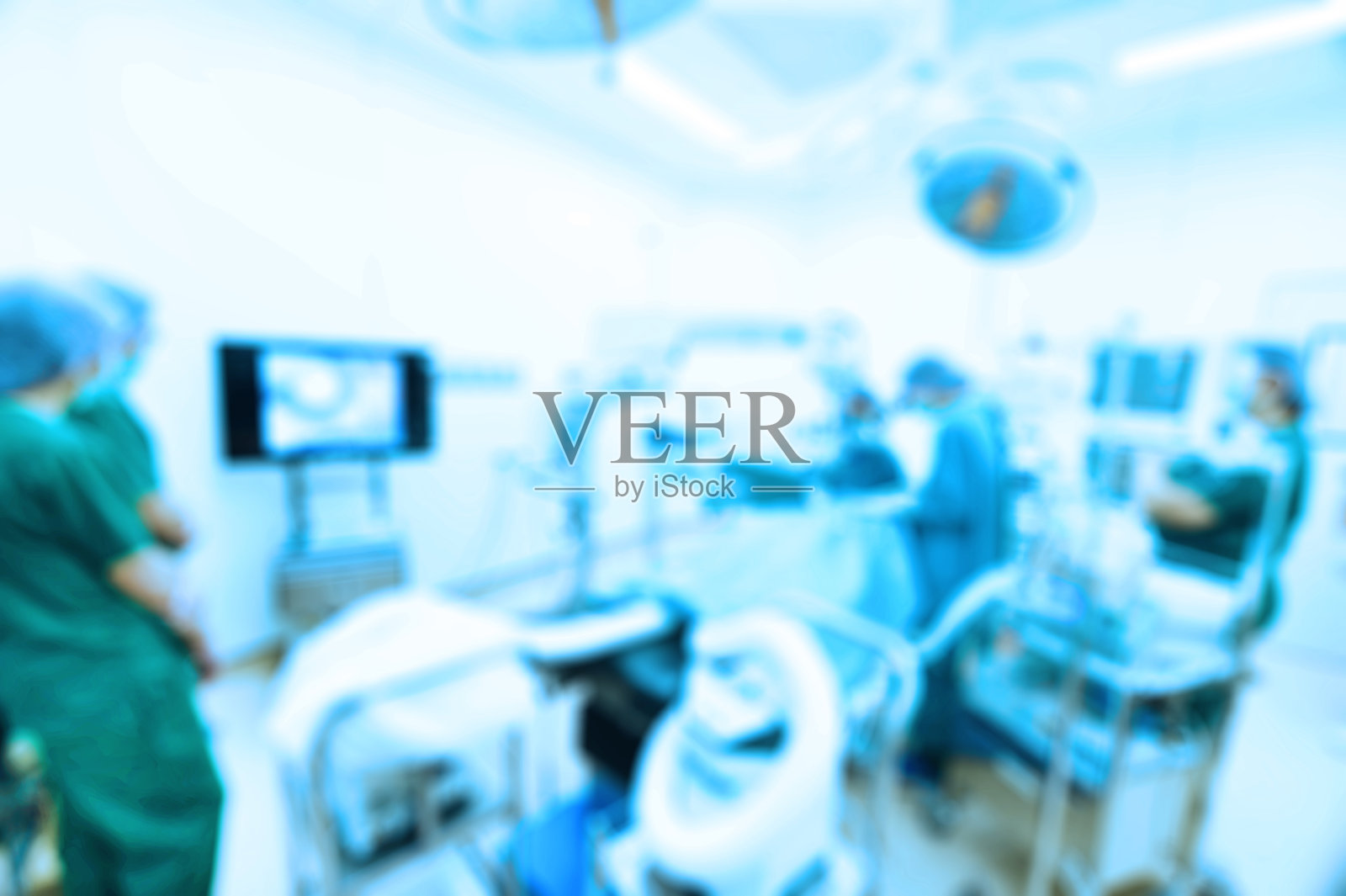 手术室里兽医手术组模糊照片摄影图片