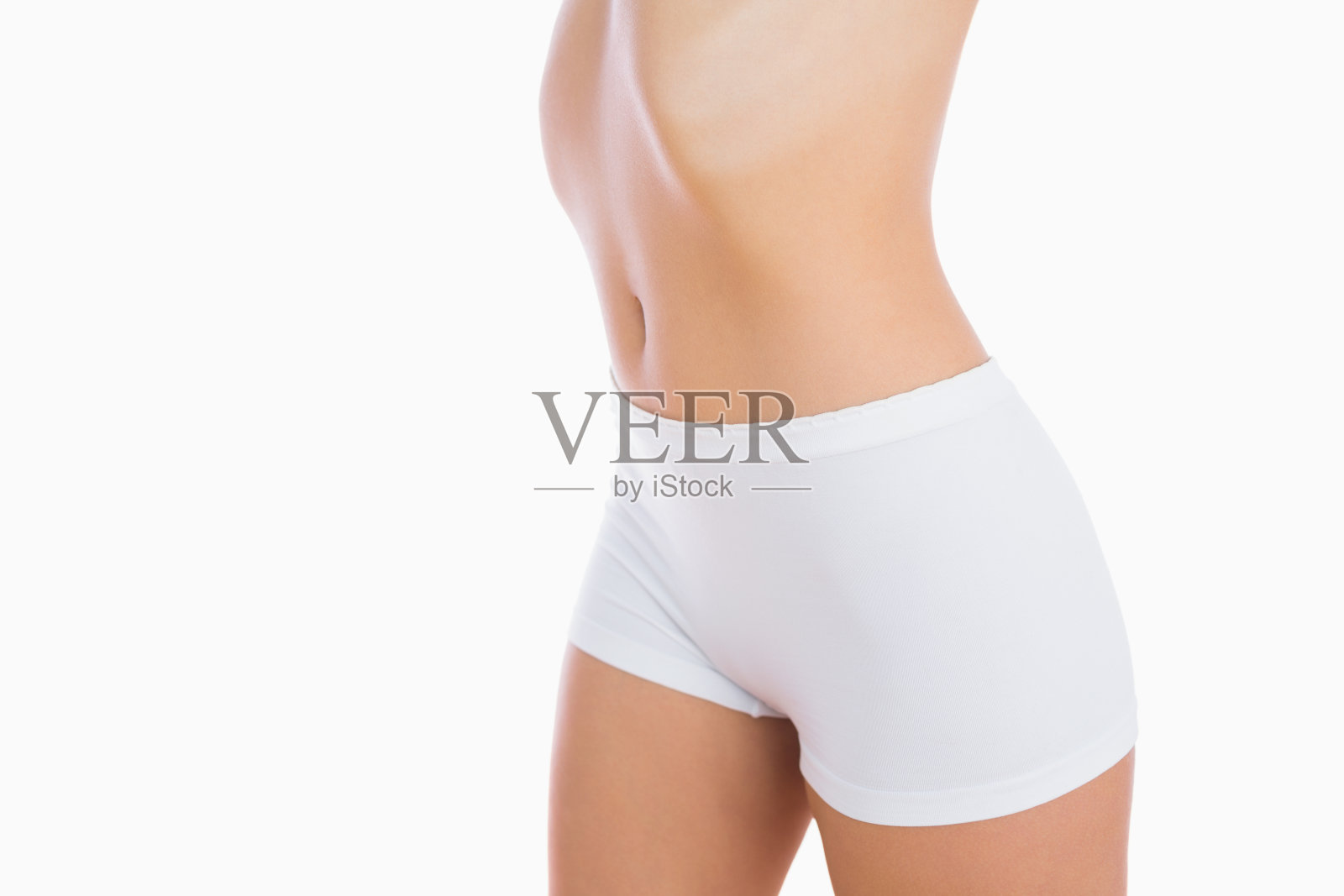 穿着短裤的苗条女人照片摄影图片