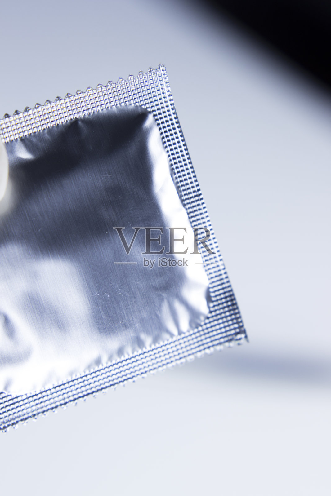 橡胶乳胶避孕套男性避孕安全疾病和怀孕免费性。照片摄影图片