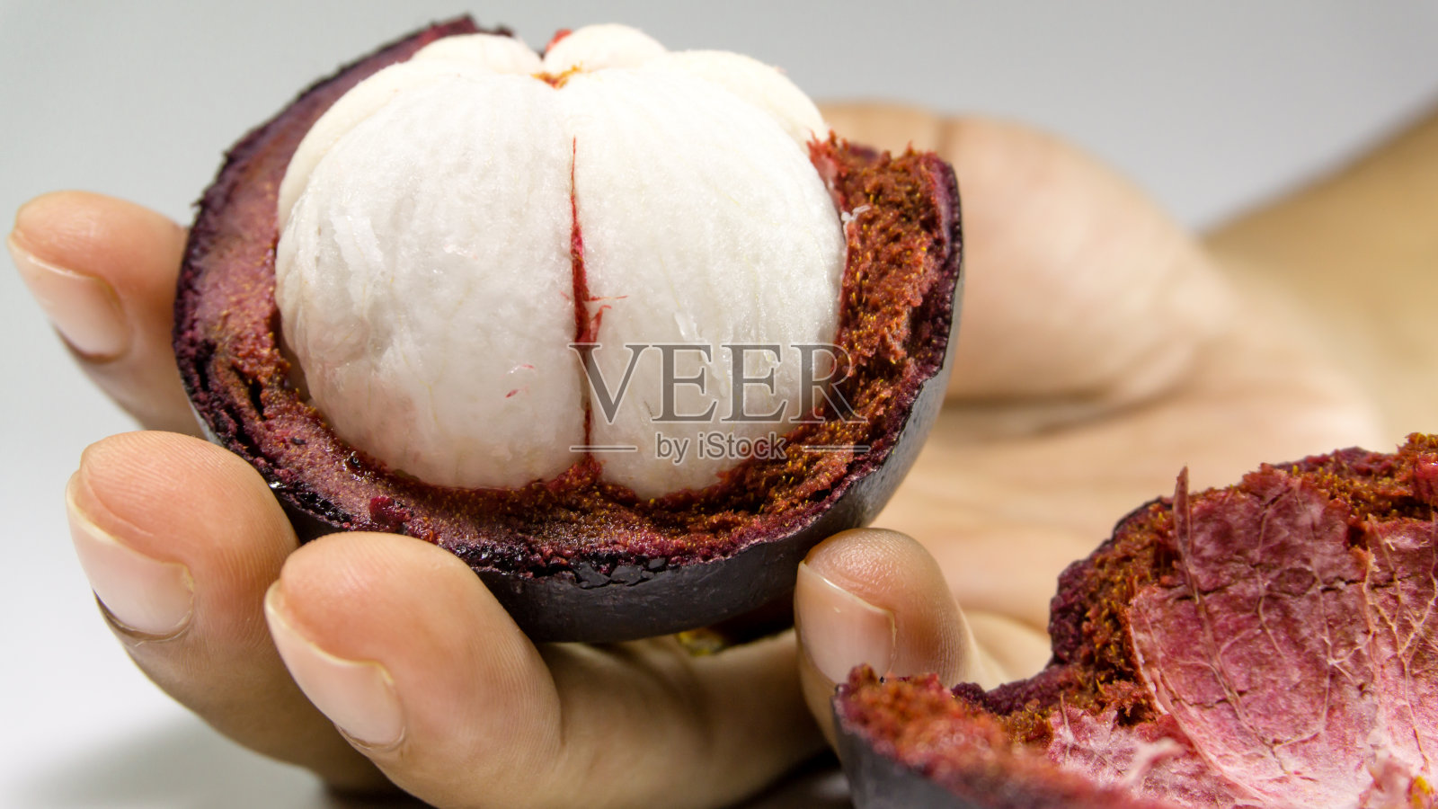 山竹/山竹在手边。照片摄影图片