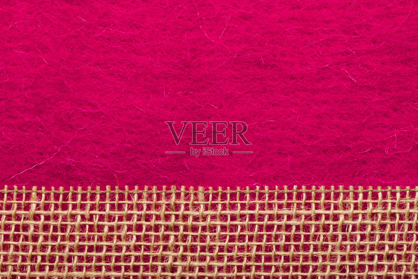 黄麻网在粉红色的背景照片摄影图片