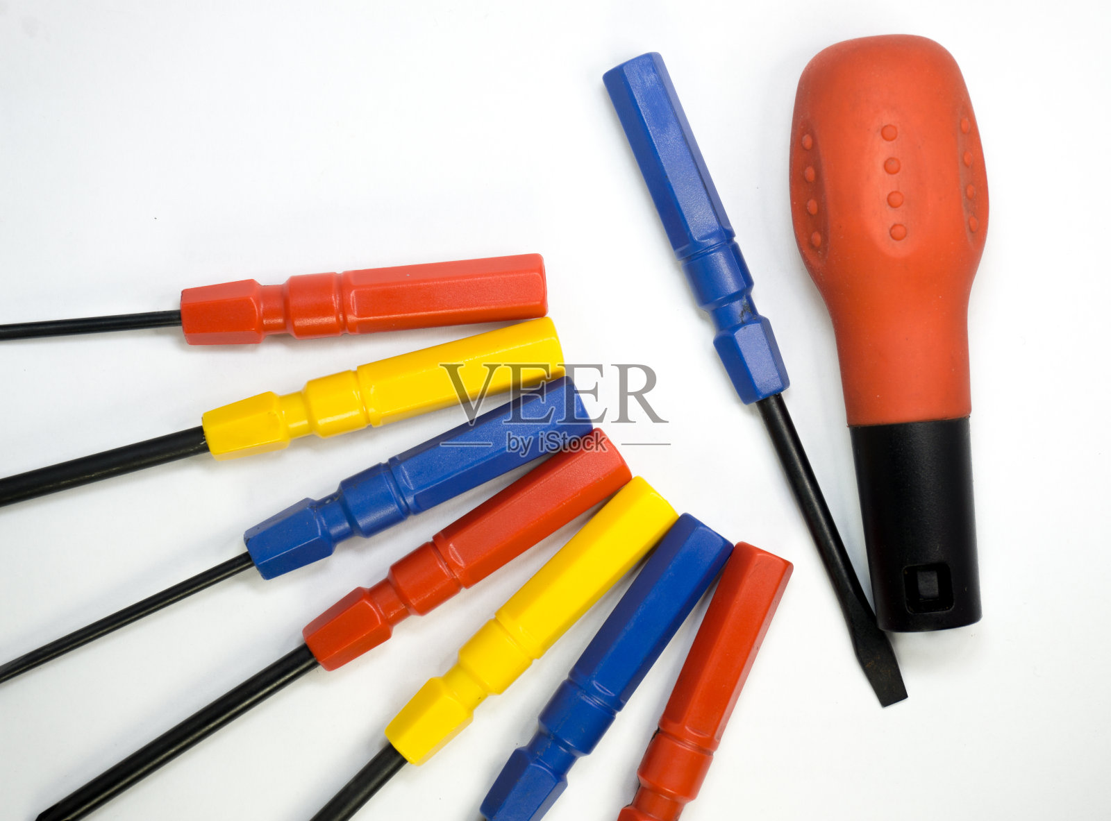 一套彩色螺丝刀一套与处理照片摄影图片