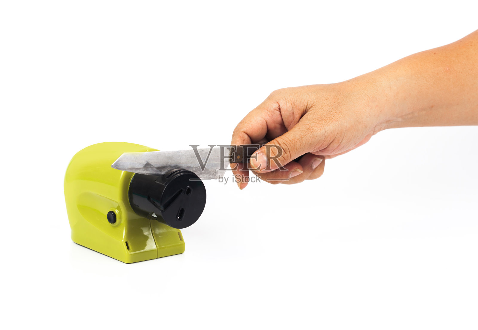 磨刀机上白刀照片摄影图片