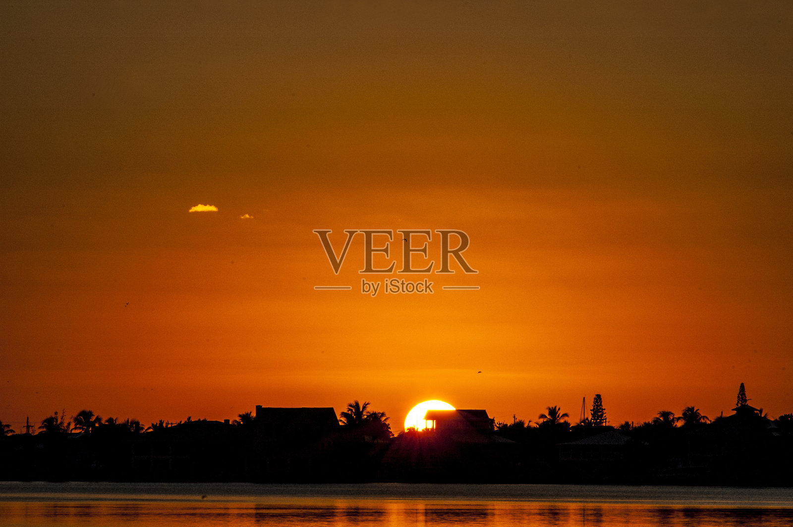 日落在岛照片摄影图片