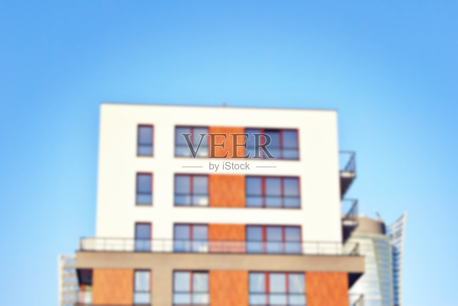 抽象模糊的现代公寓建筑。照片摄影图片