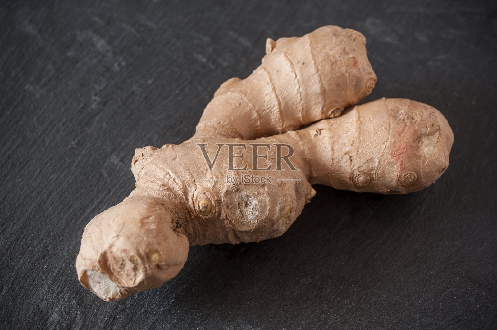 姜在黑板的背景上照片摄影图片