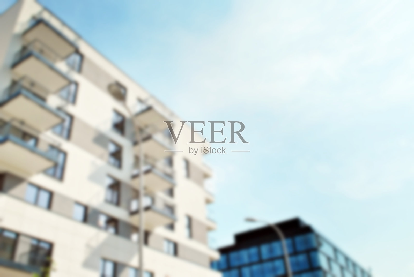 抽象模糊的现代公寓建筑。照片摄影图片