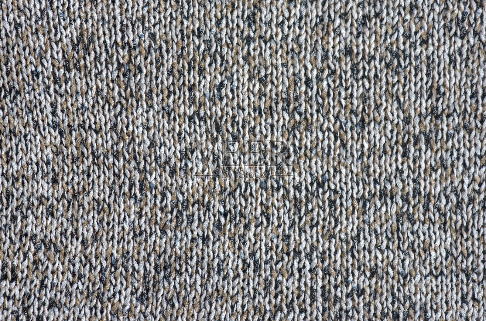 特写背景灰色或棕色毛衣抽象图案照片摄影图片