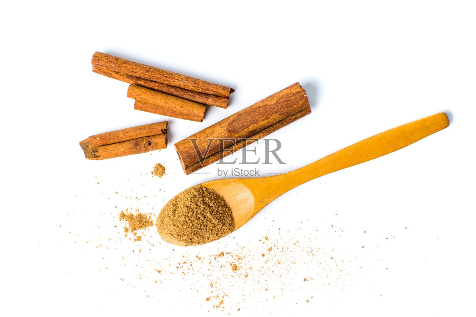肉桂粉和棍棒分离照片摄影图片