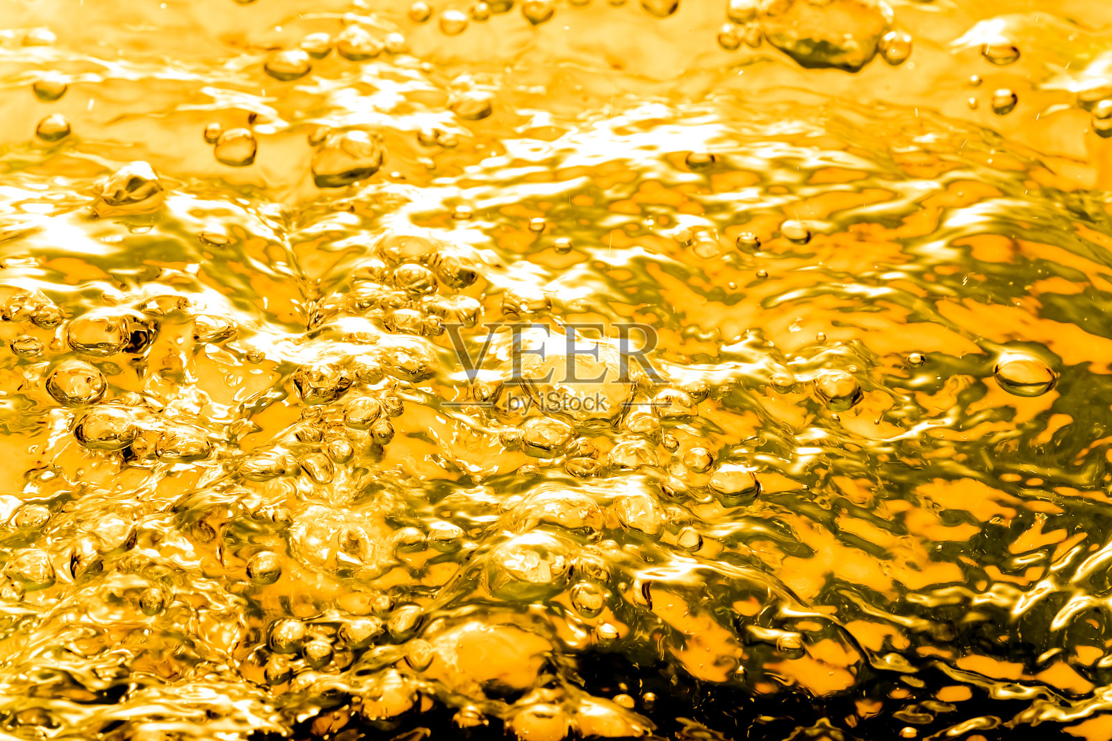 水或油中的液体黄金气泡，美丽的抽象背景照片摄影图片
