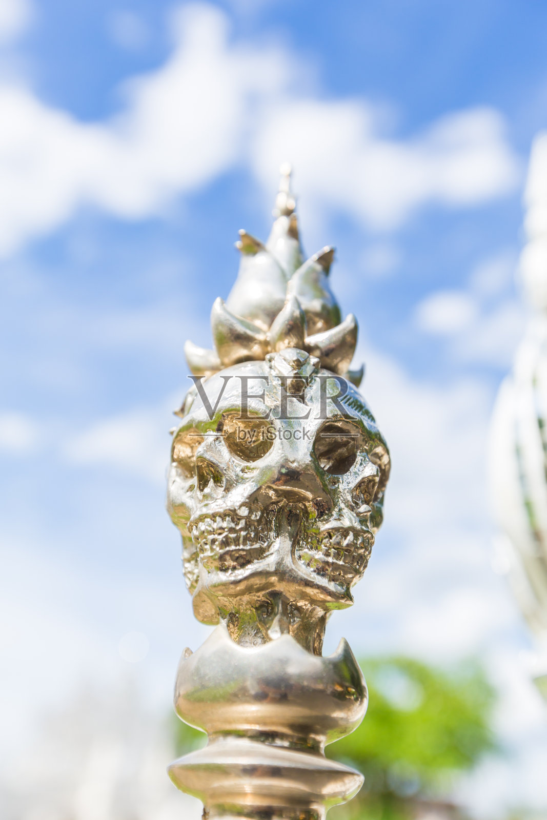 泰国寺庙的柱顶形头盖骨。这是地狱区域模拟照片摄影图片