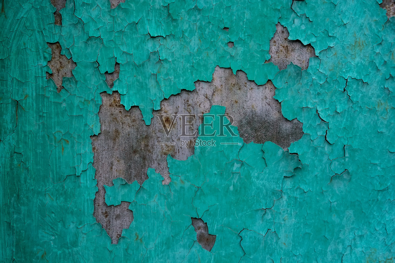 旧灰泥墙面上的蓝色裂痕画照片摄影图片
