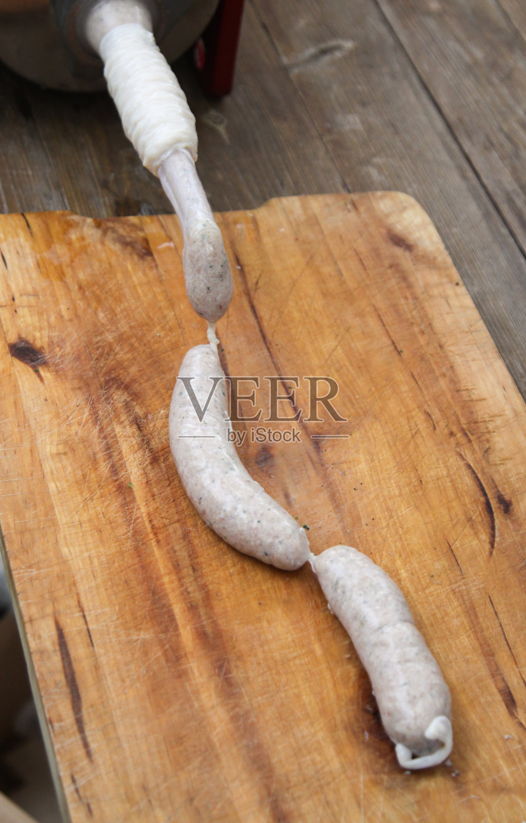 巴伐利亚屠夫制作Weißwurst白香肠照片摄影图片