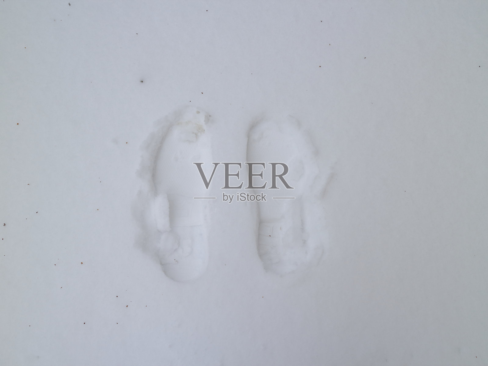 雪中有人类的痕迹照片摄影图片