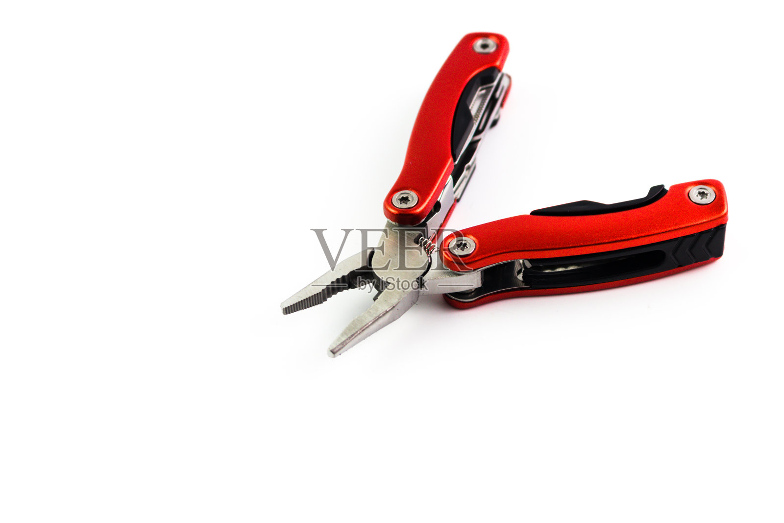 红色手柄的银金属钳子照片摄影图片