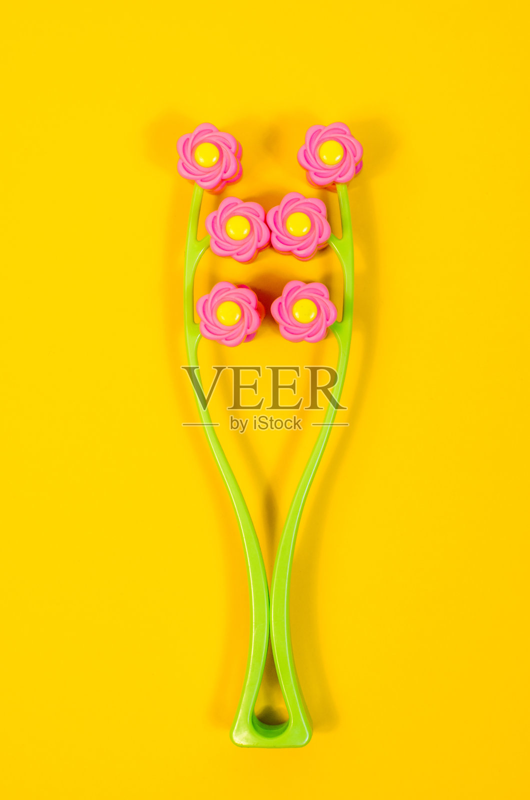 面部滚轮按摩仪，针对面部脂肪团，紧致肌肤，改善血液循环，促进细胞再生，颈部，手臂，腿部，spa护肤概念治疗医学照片摄影图片