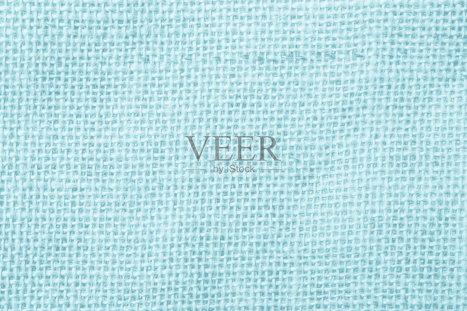 蓝色帆布或黄麻粗布编织织物纹理背景。咖啡豆纺织品。照片摄影图片