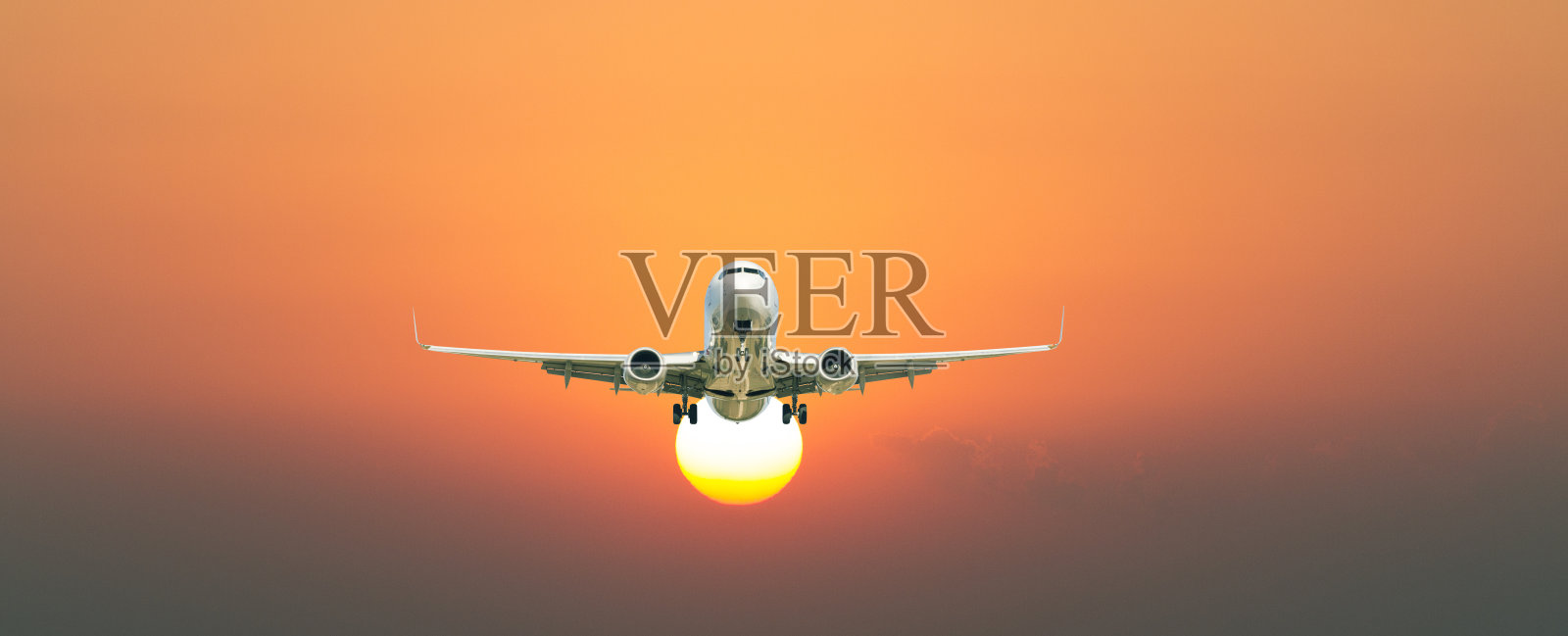 日落时的飞机照片摄影图片