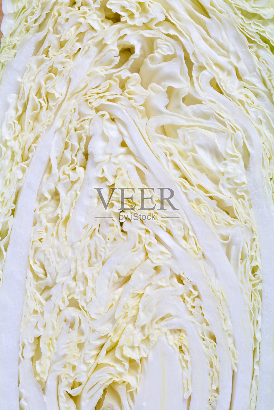 这是切成一半的大白菜的特写照片摄影图片