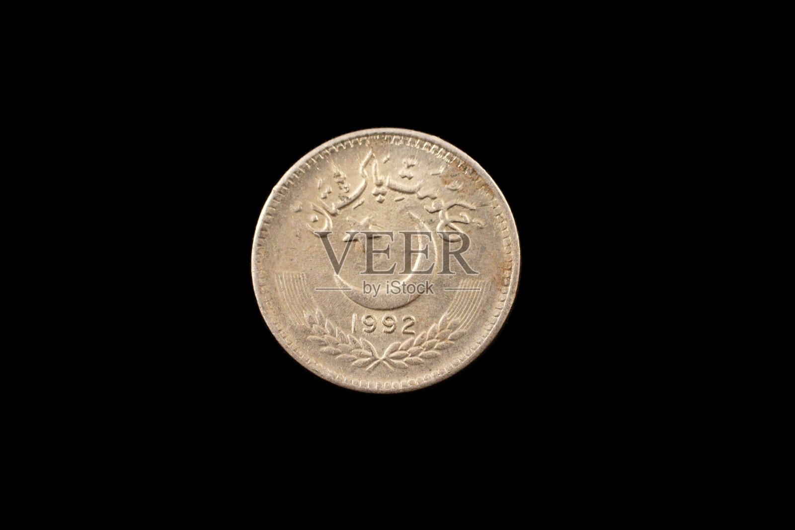 旧巴基斯坦25卢比硬币孤立在黑色照片摄影图片