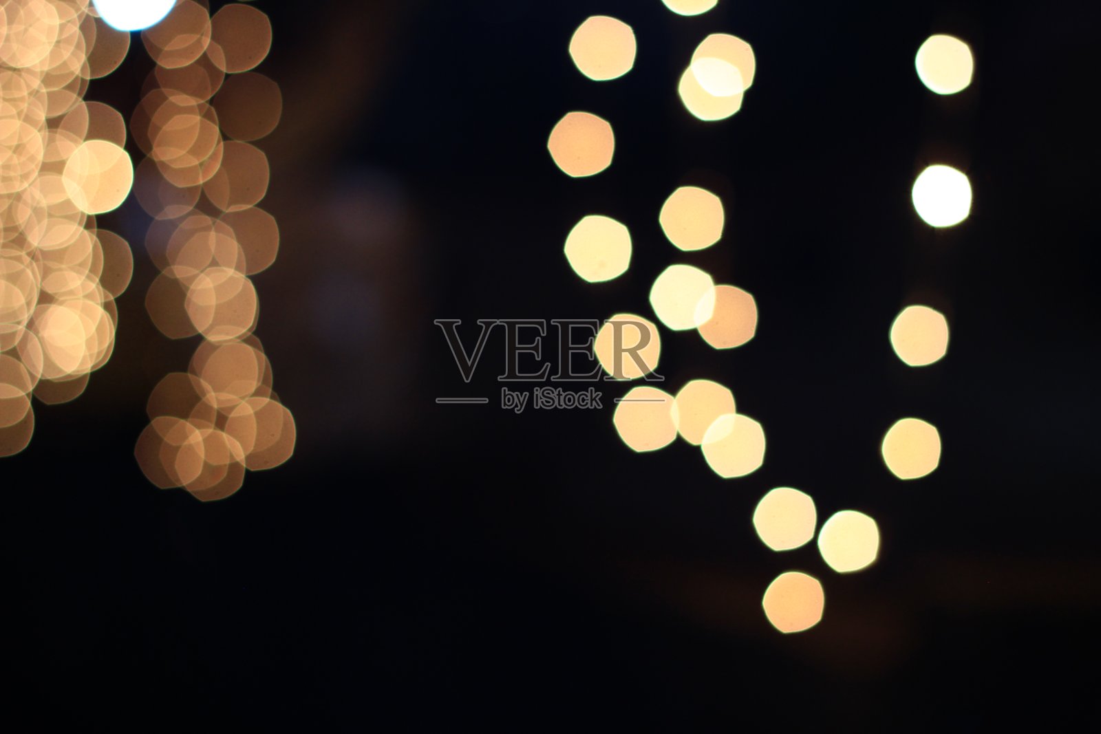 黄色五角形的五角形散景以覆盖背景圣诞情人节庆祝节日的心情照片摄影图片